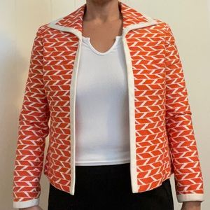 Orange and cream colored blazer